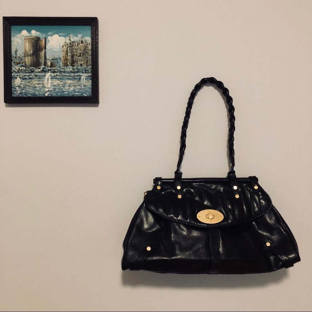 Cleo and Patek Paris purse